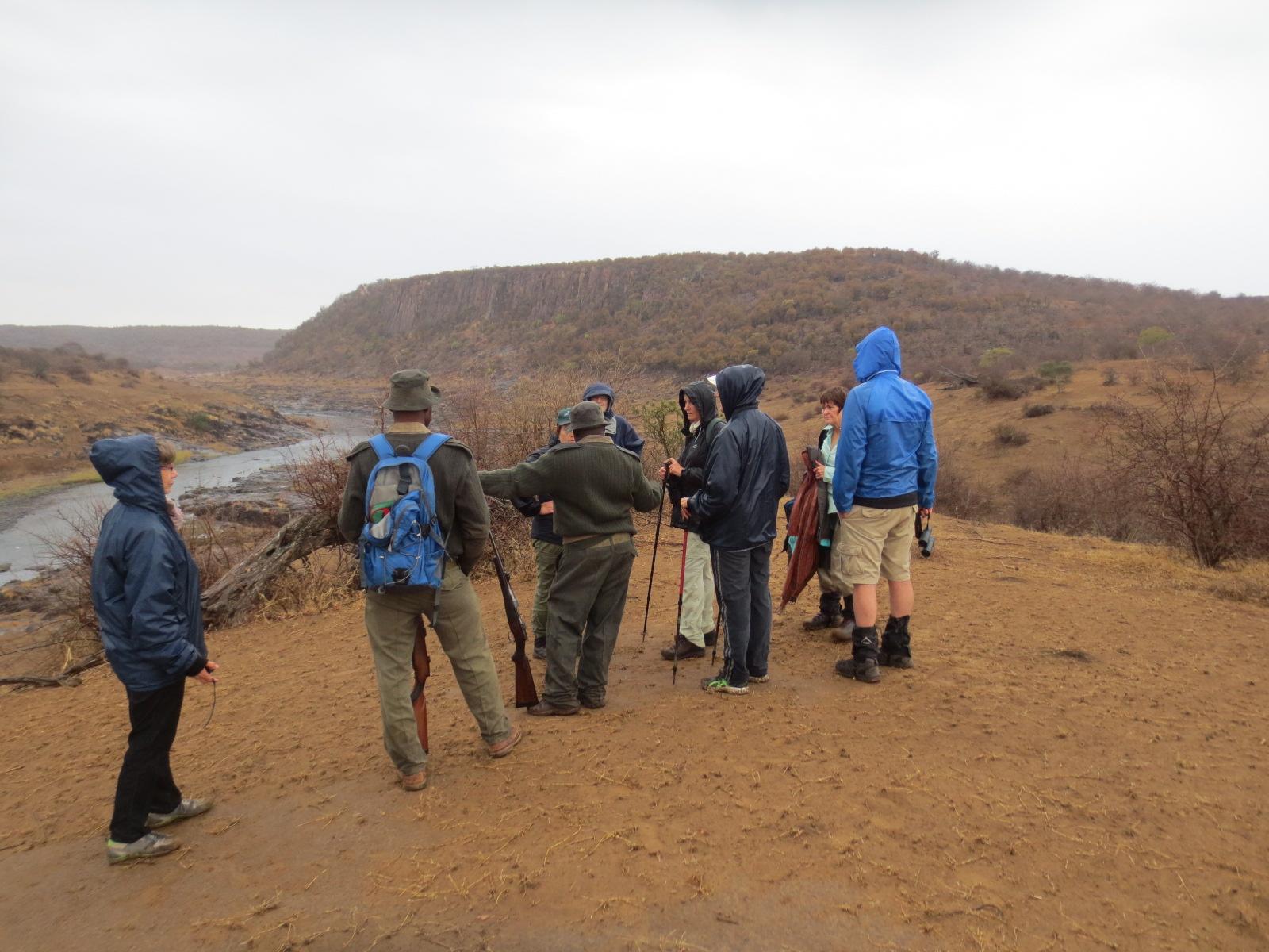 Last minute instructions from Aron, overlooking the Oliphant's river. The confluence is around the corner at the bask of the mountain on the right.